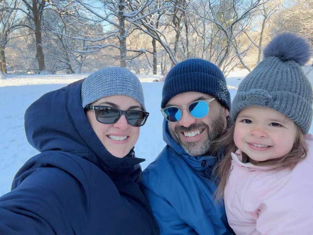 Family selfie in a snow-covered park